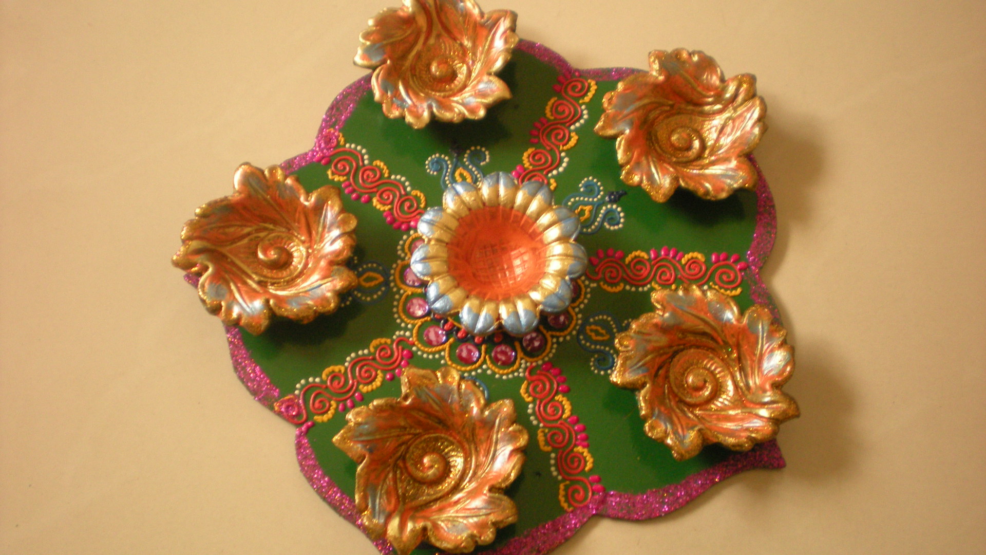 Manufacturers Exporters and Wholesale Suppliers of Rangoli diya plates 02 Nagpur Maharashtra